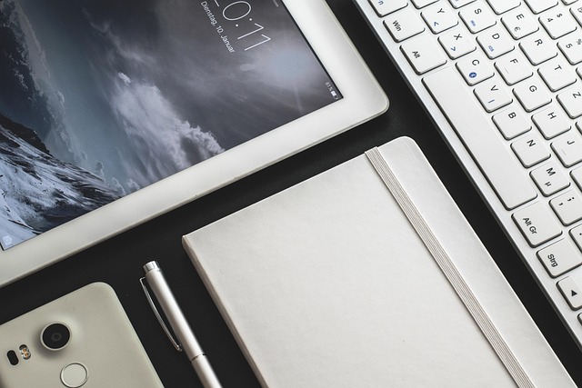 Team collaborating using AI-powered business tools on laptops in a modern workspace